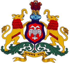Emblem of Karnataka with Gandaberunda, Ashoka Lions, and the motto.