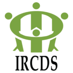 Logo for IRCDS, showing four green abstract figures standing in a circle, holding hands.